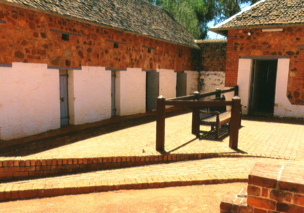 Gaol Courtyard with cells on left